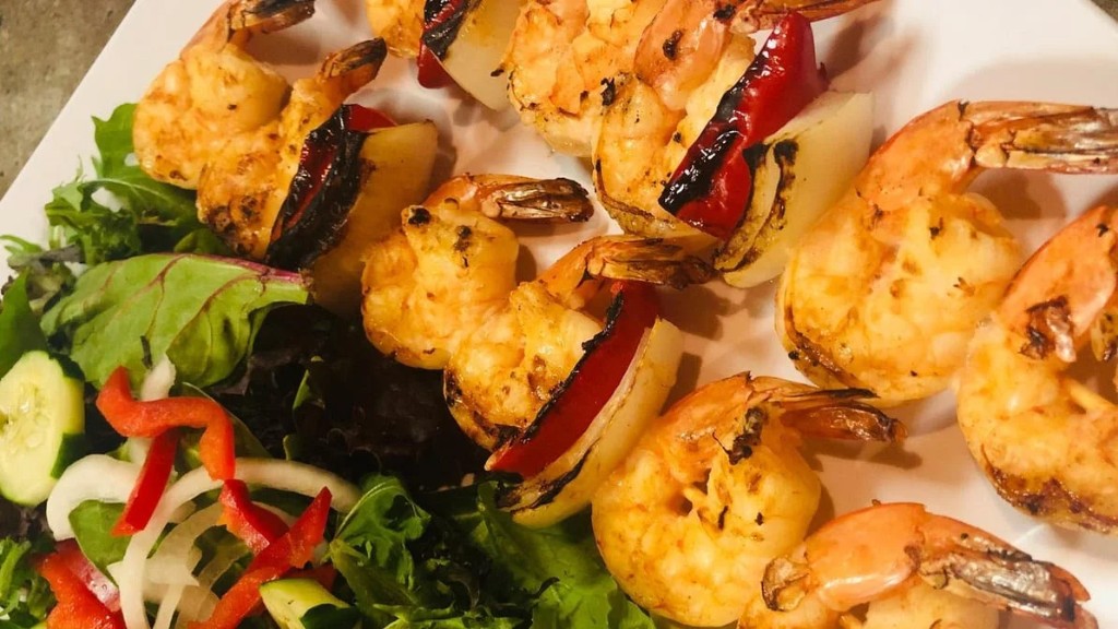 Grilled shrimp skewers with side salad